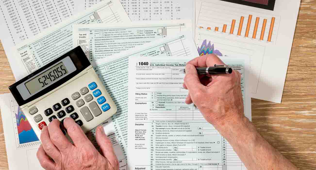 مالیات بر درآمد - شرکت نیکان حسابرس